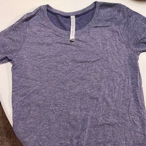 Gently worn, Purple Lululemon Swiftly Relaxed-fit short sleeve shirt. Size 8